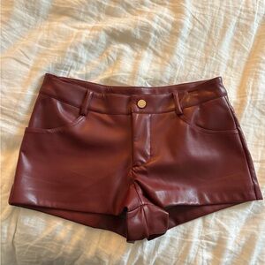 We Wore What Women's Faux Leather Shorts in burgundy
